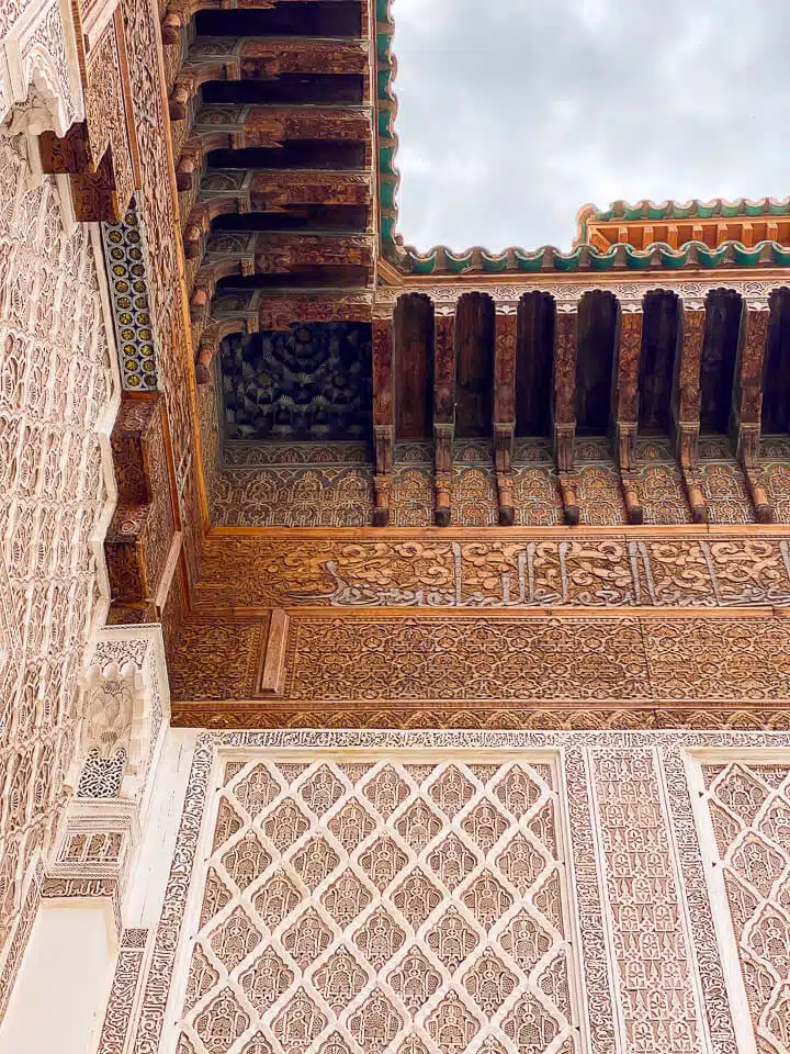 Carved and painted roof beams in the Ben Youssef Madrasa are an impressive example of Moroccan craftsmanship.