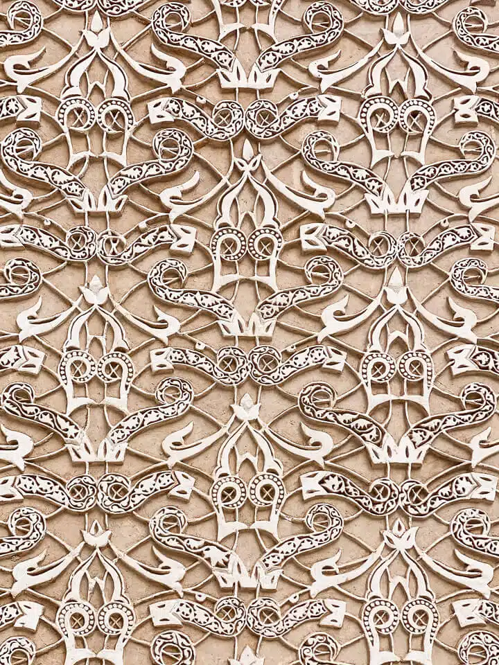 Islamic stucco decorations in the Ben Youssef Madrasa.